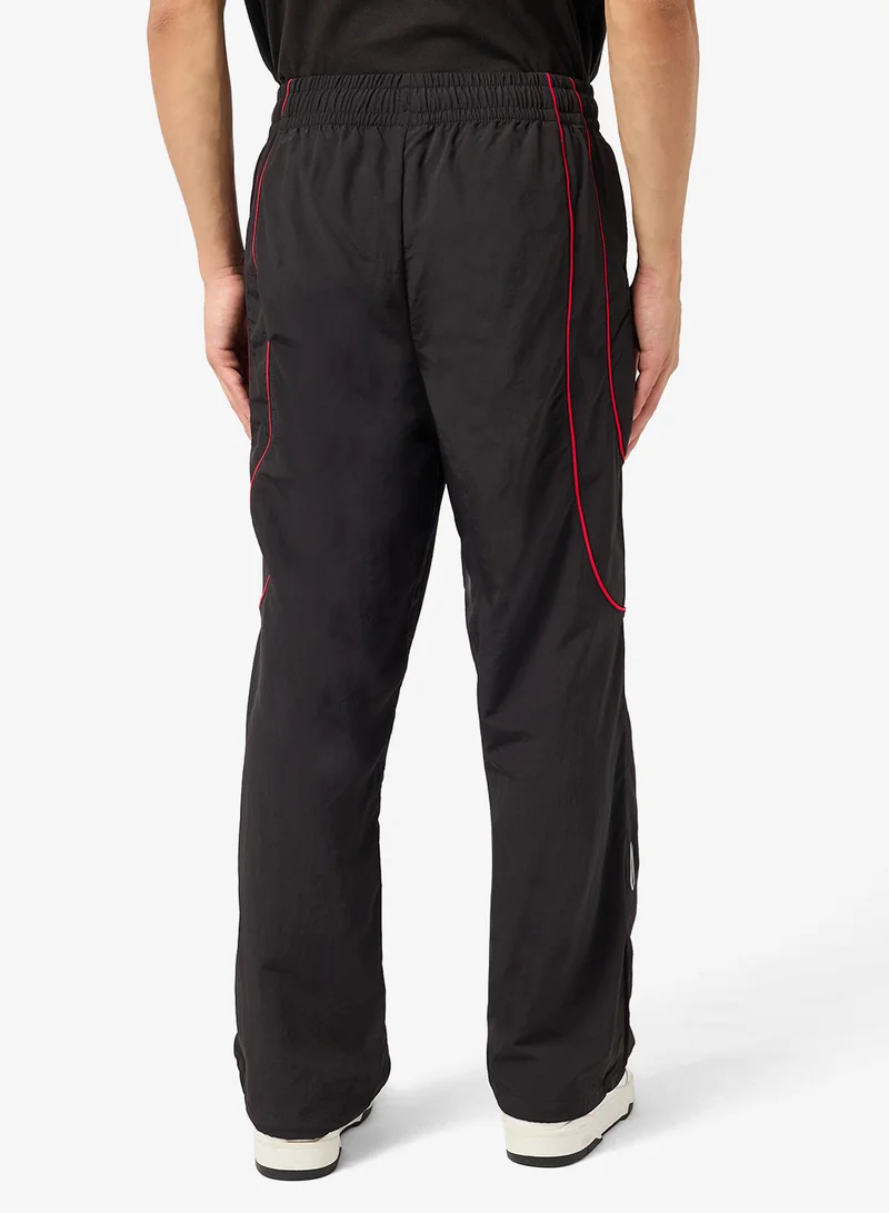 PUMA Tech-X Relaxed Fit Woven Track Pants