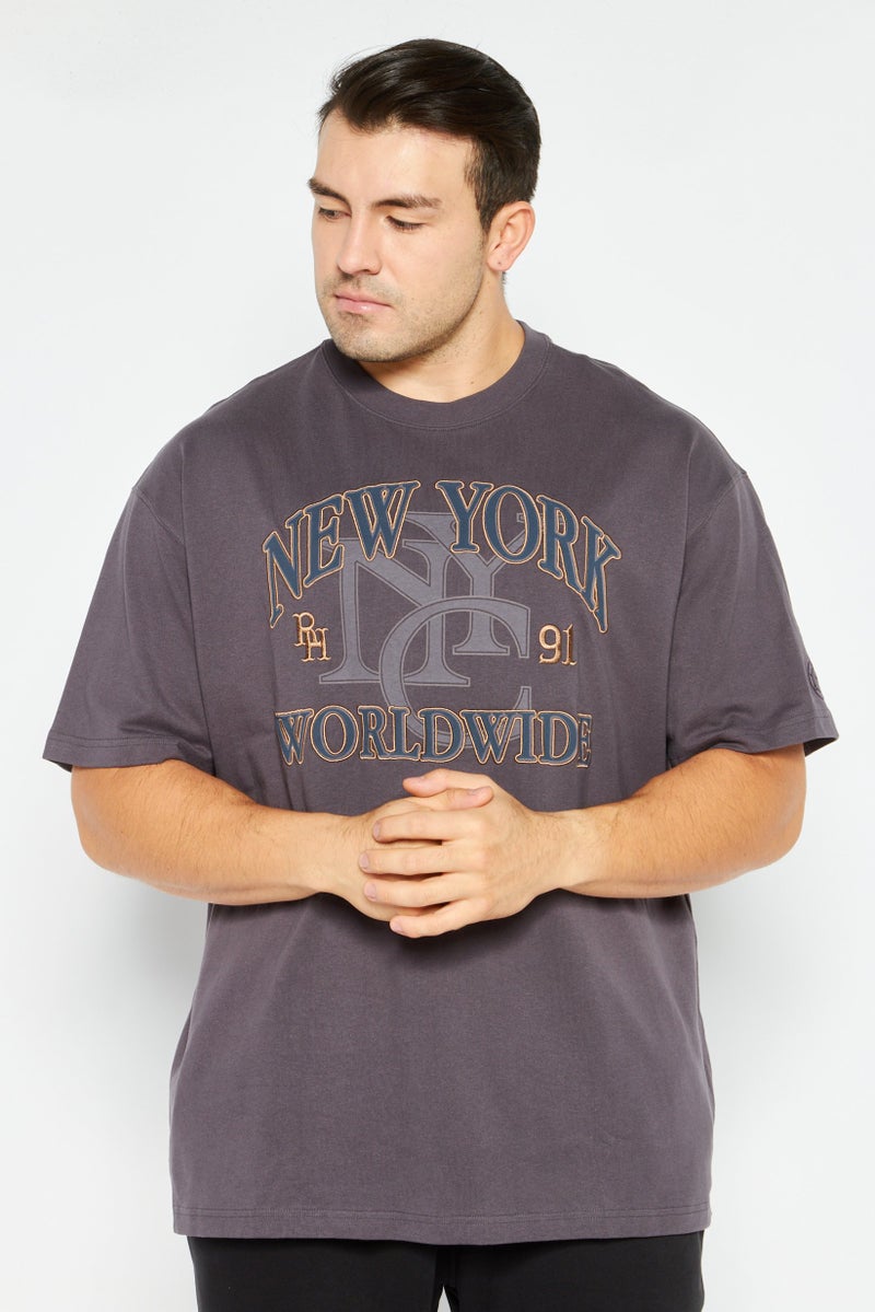 PUMA Men Sportswear Fit Short Sleeves Outdoor T-shirt, Dark Coal - Image 1