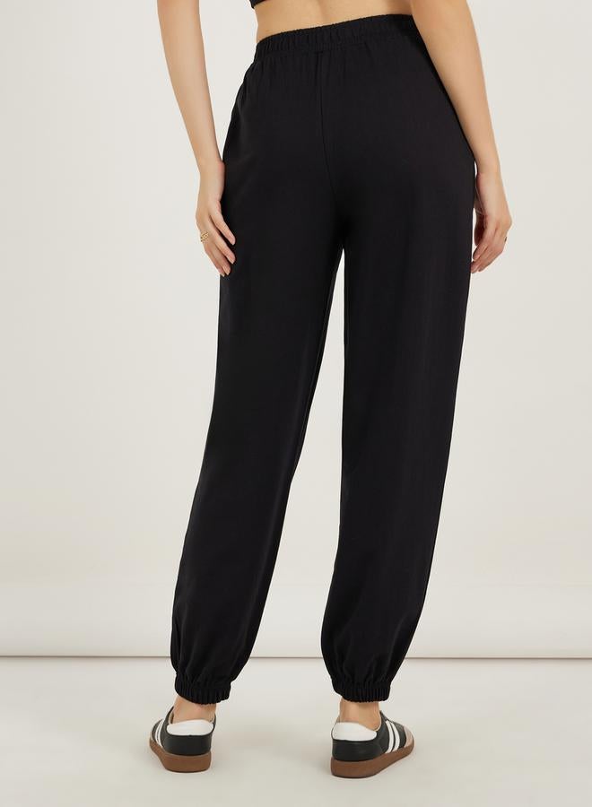 ستايلي بنطلون رياضي بخصر مرتفع ورباط متقاطع وأرجل مستقيمة - Image 4