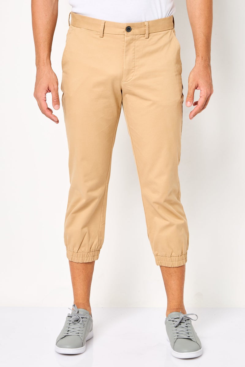 LACOSTE سروال جوجرز ضيق للرجال، بيج - Image 1