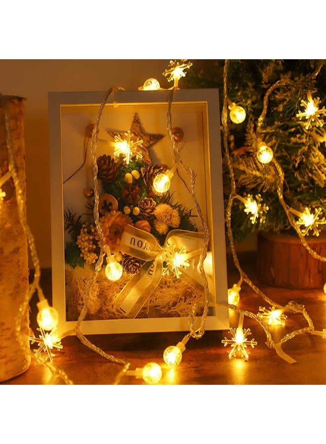 سلسلة بطول 12 مترًا من 100 كرة بلورية LED، بحجم تقريبي 473 بوصة، 100 مصباح خرافي كروي على شكل ندفة ثلجية LED، مع جهاز تحكم عن بعد، ولوحة شمسية، و8 أوضاع، مقاومة للماء P65، مناسبة للحدائق والمنازل والفناءات وإضاءة الحفلات وغرف النوم والخيام والعليات والتخييم والشرفات والتراسات والحفلات وديكورات الزفاف والضوء الأبيض الدافئ. - Image 3