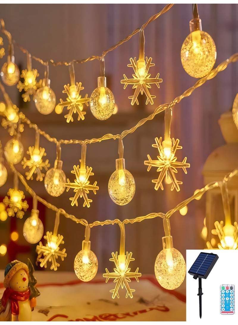 سلسلة بطول 12 مترًا من 100 كرة بلورية LED، بحجم تقريبي 473 بوصة، 100 مصباح خرافي كروي على شكل ندفة ثلجية LED، مع جهاز تحكم عن بعد، ولوحة شمسية، و8 أوضاع، مقاومة للماء P65، مناسبة للحدائق والمنازل والفناءات وإضاءة الحفلات وغرف النوم والخيام والعليات والتخييم والشرفات والتراسات والحفلات وديكورات الزفاف والضوء الأبيض الدافئ. - Image 1