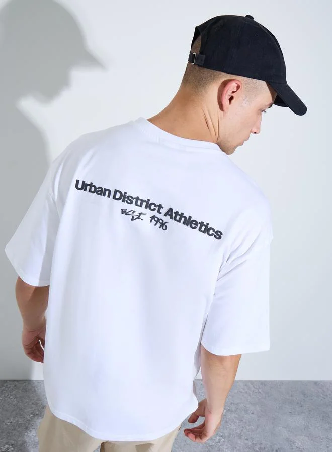 ستايلي Men White Graphic Print Oversized T-Shirt