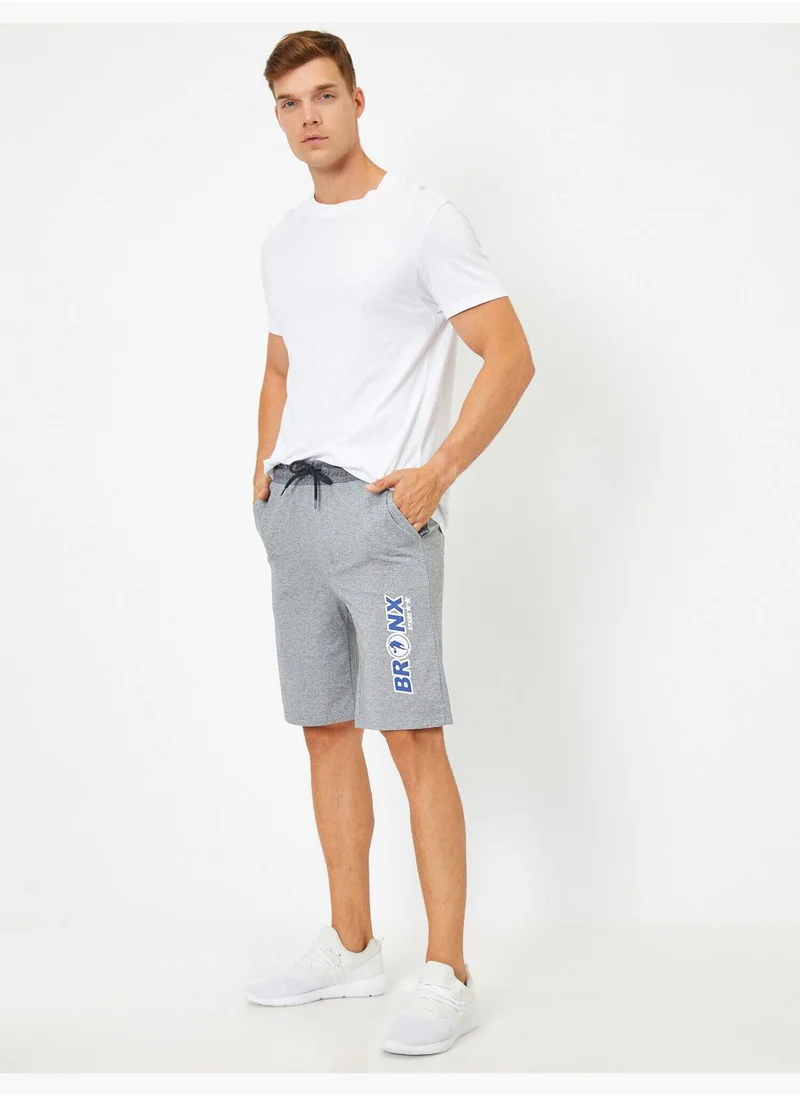 KOTON Pocket Letter Printed Shorts