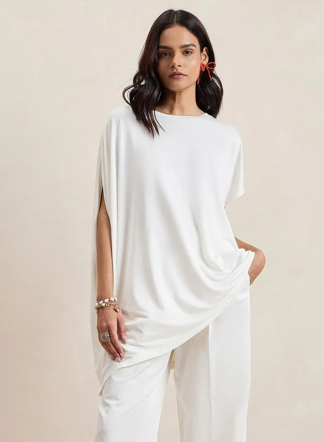 Femmella Femmella Oversized Round Neck Asymmetrical Hem Top