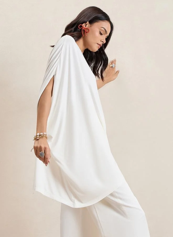 Femmella Femmella Oversized Round Neck Asymmetrical Hem Top