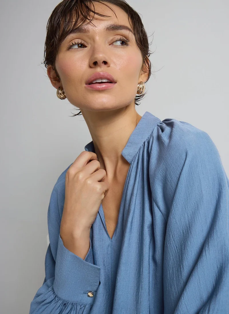 ماتلان بلوزة بوب أوفر بأكمام طويلة زرقاء من إت يو