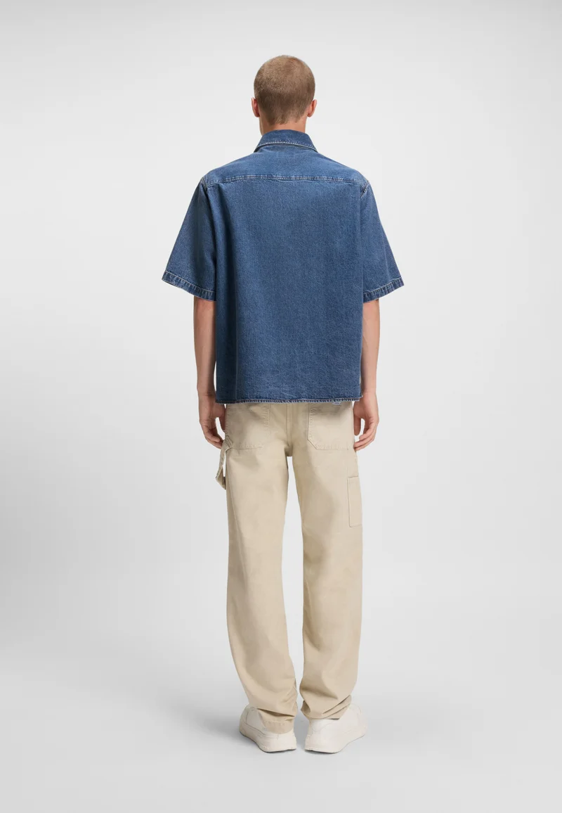 هوجو Oversized-fit shirt in blue denim with contrast stitching