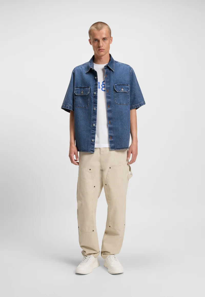 HUGO Oversized-fit shirt in blue denim with contrast stitching