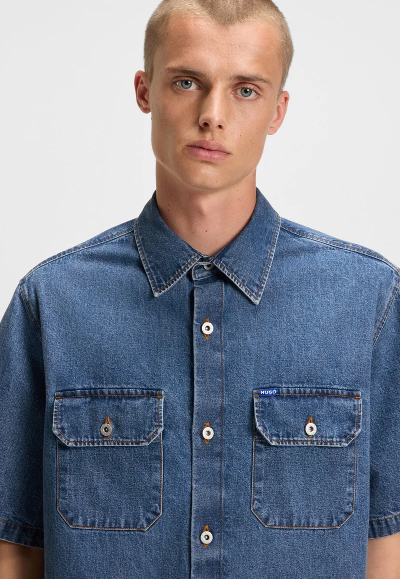 HUGO Oversized-fit shirt in blue denim with contrast stitching