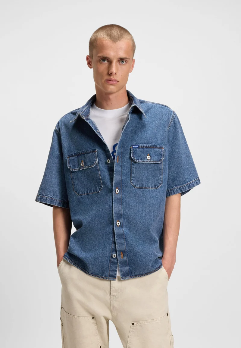 HUGO Oversized-fit shirt in blue denim with contrast stitching