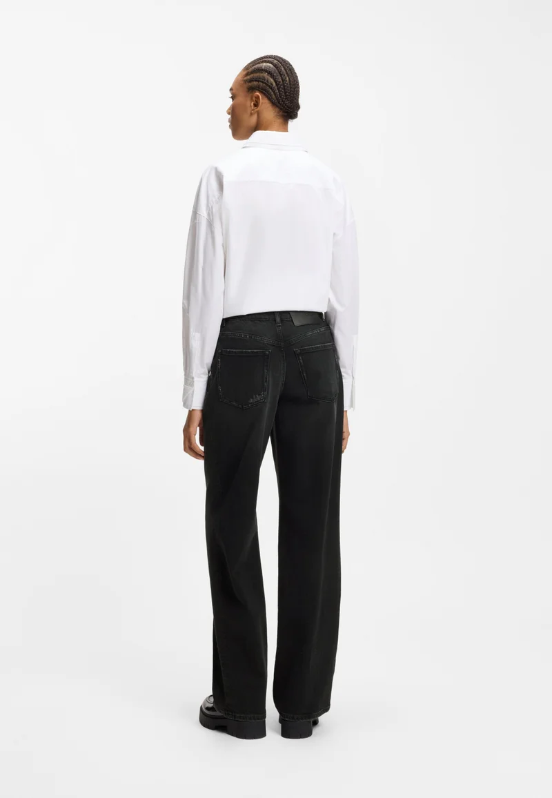 هوجو جينز واسع الساقين من دنيم مريح قابل للتمدد باللون الأسود