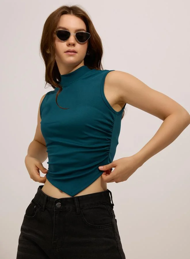 أوجيدر بلوزة بياقة عالية وتفاصيل مزمومة جانبية