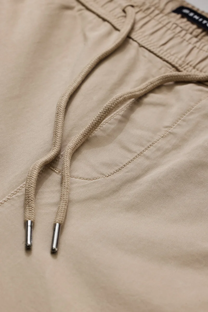 SNITCH بنطلون كارجو بيج بقصة ضيقة وخصر متوسط