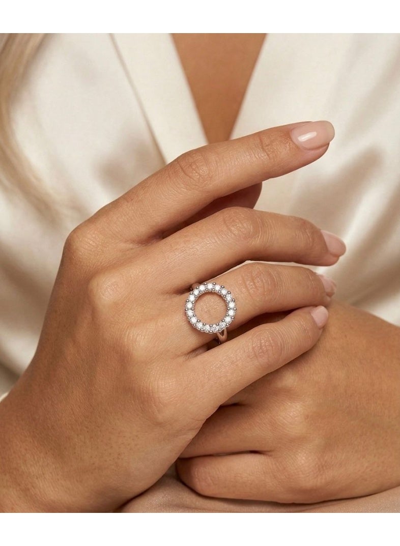 Nevara An elegant women's jewelry set featuring a necklace, earrings, and a ring with a circular design studded with sparkling crystals, offering a sophisticated, modern look suitable for special occasions, evening events, and everyday wear. - Image 5