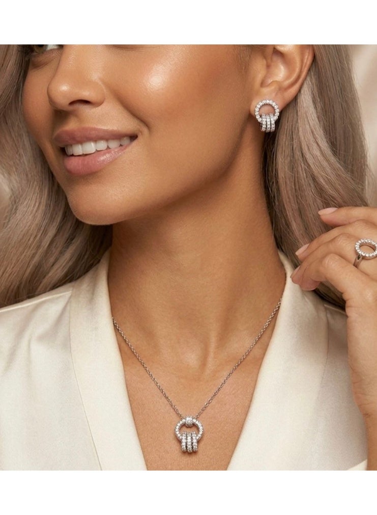Nevara An elegant women's jewelry set featuring a necklace, earrings, and a ring with a circular design studded with sparkling crystals, offering a sophisticated, modern look suitable for special occasions, evening events, and everyday wear. - Image 4
