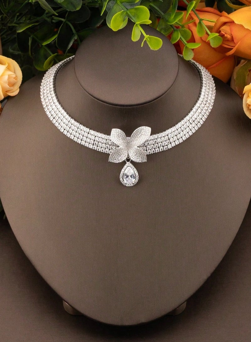 Women's accessories set consisting of a necklace and earrings in silver with a flower design studded with shiny stones, suitable for brides, engagement parties, and all special occasions  - Image 2