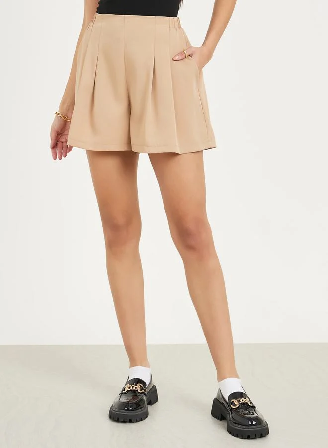 Styli Pleated Front Shorts with Pockets