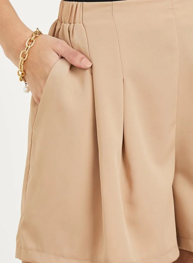 Styli Pleated Front Shorts with Pockets