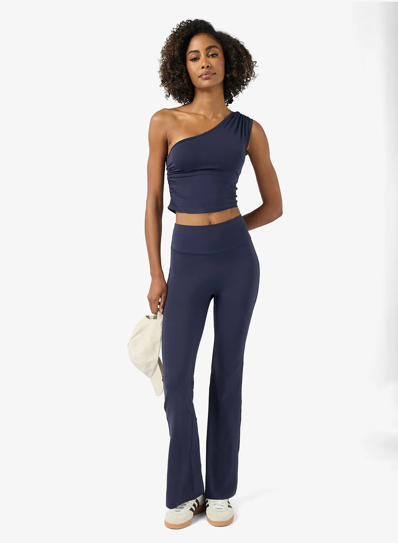 فورورد One Shoulder Training Top & Flared Pant Set