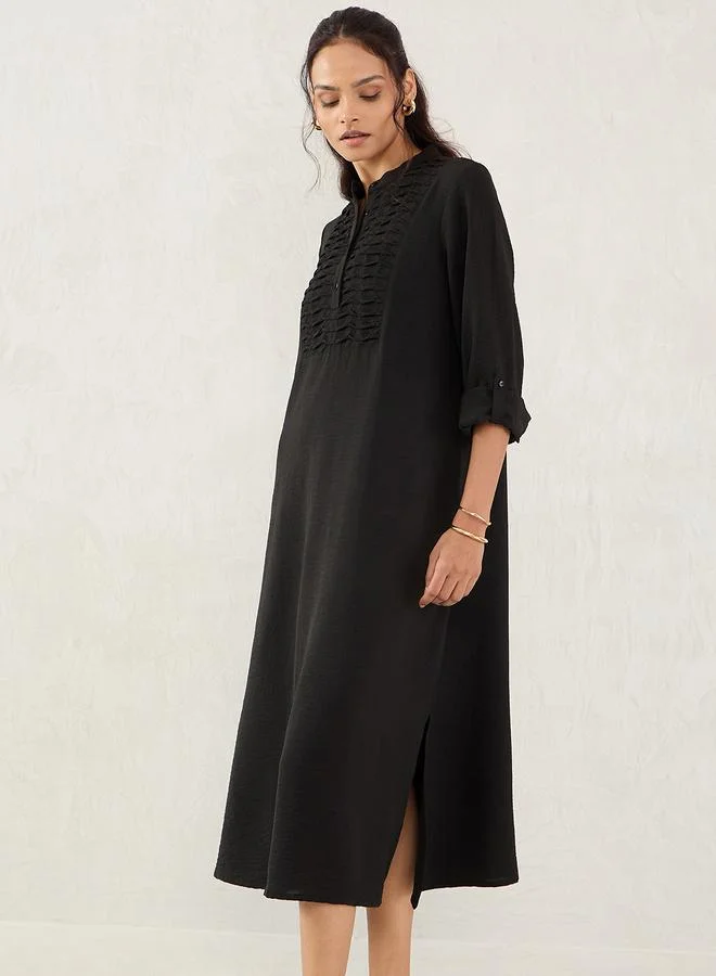 فيميلا فستان ميدي بياقة ماندارين وأزرار أمامية