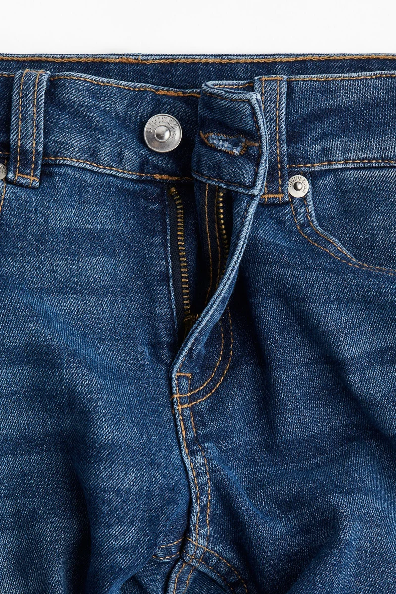 اتش اند ام جينز بحافة واسعة وخصر منخفض