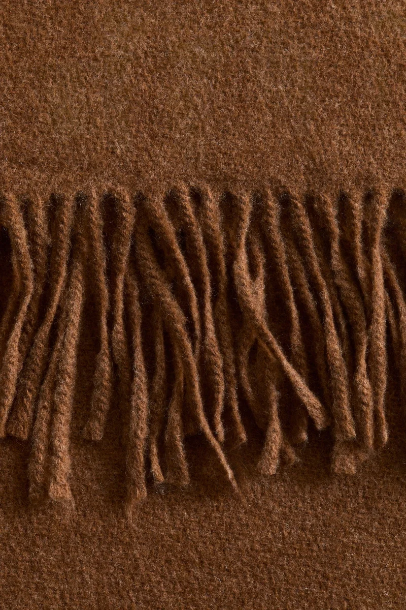H&M Fringed wool-blend blanket