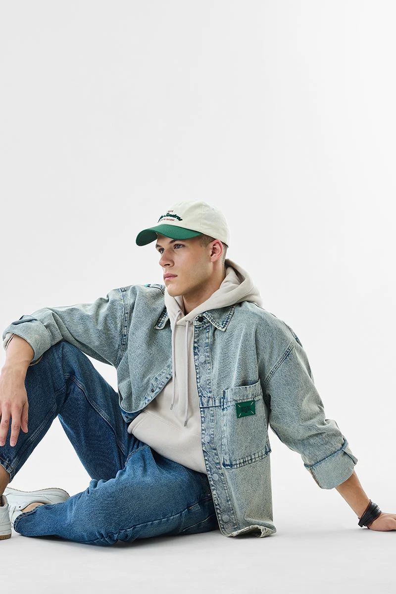 SNITCH جاكيت جينز مغسول بقصة مريحة