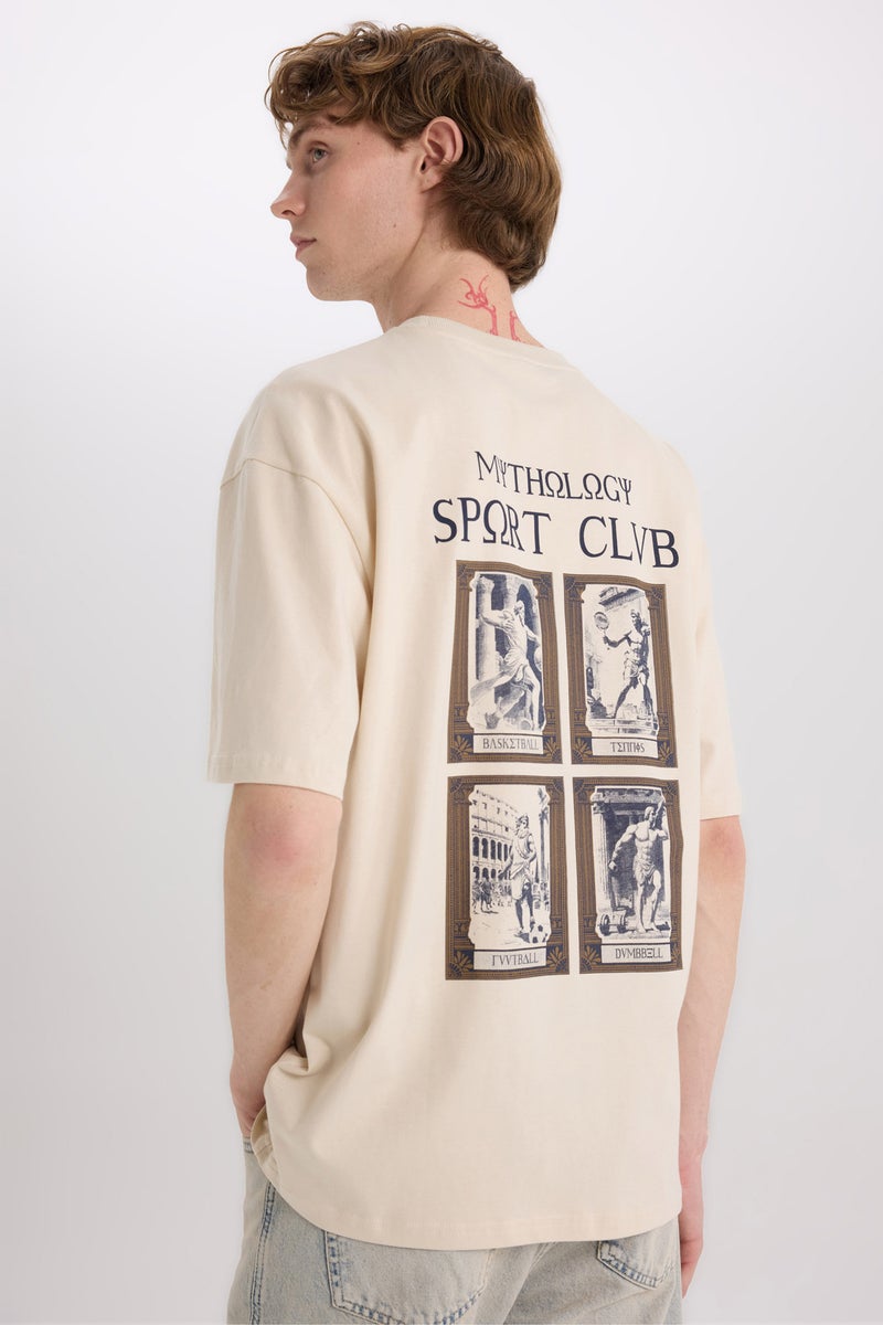 ديفاكتو تيشيرت قطن نص كم اوفر سايز برقبة مستديرة بطبعة من الخلف - Image 1