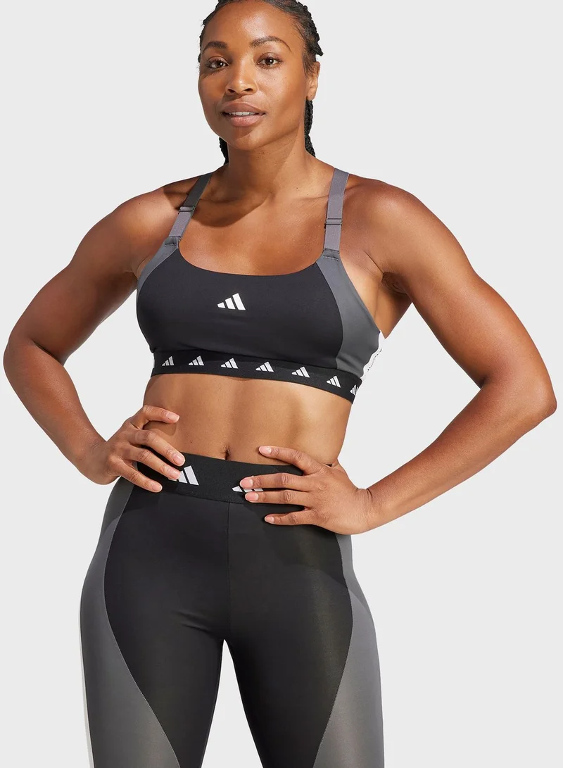 adidas صدرية رياضية بدعم متوسط وتقنية ايروردي