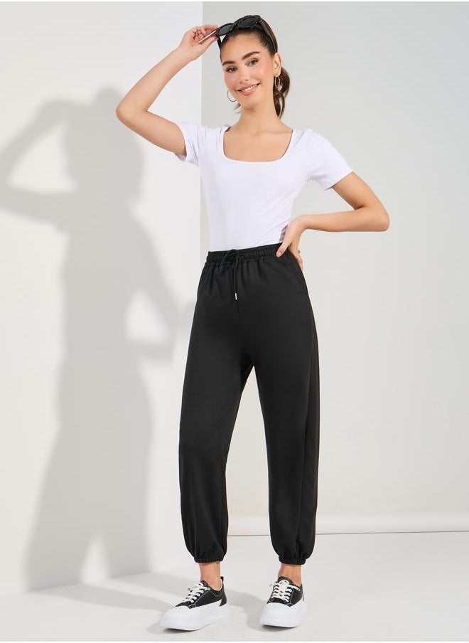 Solid Drawcord Waistband Straight Joggers - pzsku/Z017AF102F432E17670E9Z/45/_/1720784436/17ded4a7-69db-4861-8f1a-08269b60cd13