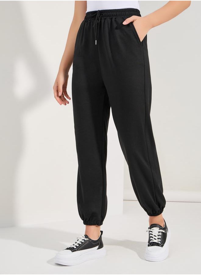 Solid Drawcord Waistband Straight Joggers - pzsku/Z017AF102F432E17670E9Z/45/_/1720784468/9d4bad7b-9426-44ef-9dec-f259ad678321