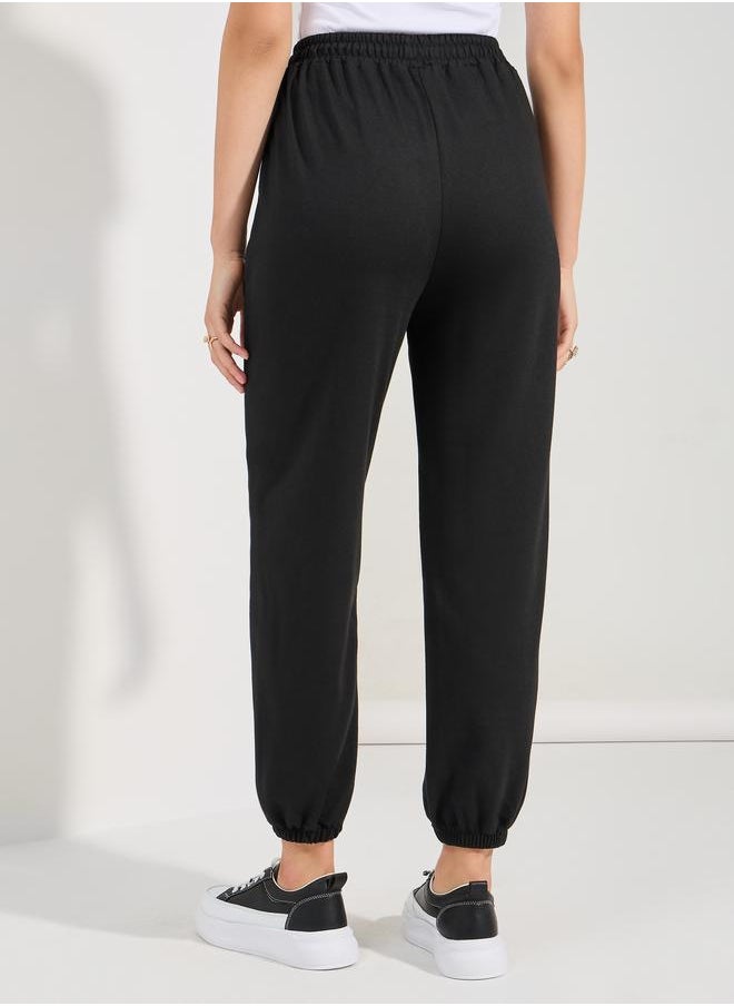 Solid Drawcord Waistband Straight Joggers - pzsku/Z017AF102F432E17670E9Z/45/_/1720784472/600cde24-10e1-41e9-88c8-210a90e42eeb