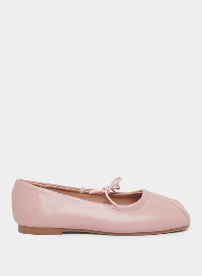 Styli Solid Slip-on Ballerinas with Bow Tie Detail - Image 1