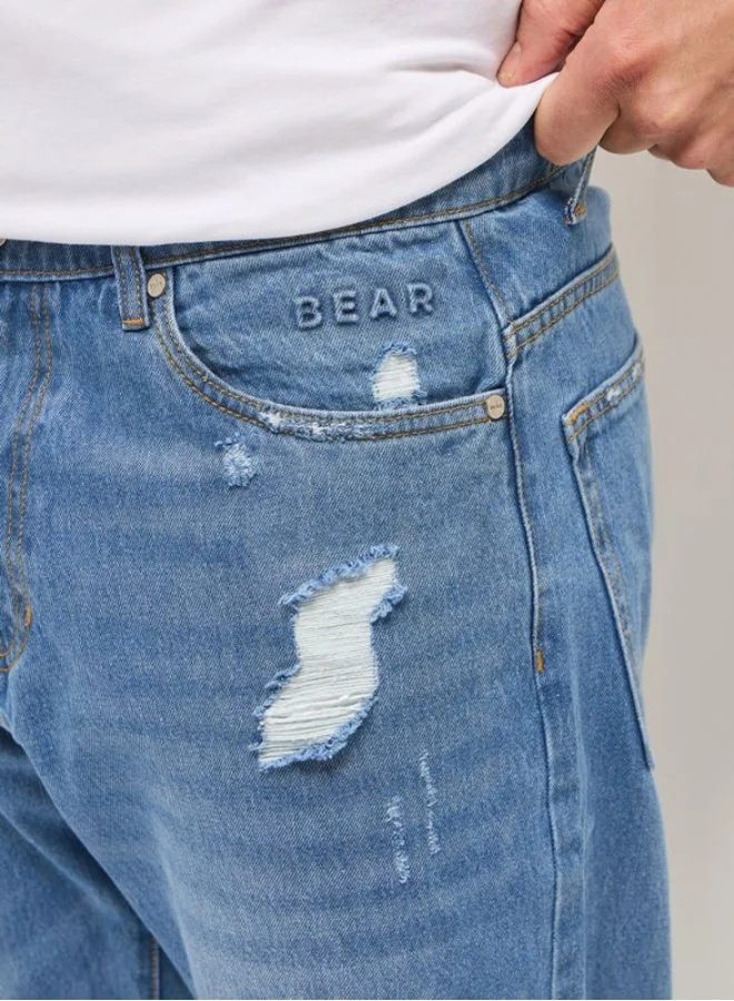The Bear House  Men's Light Blue with Light Fade Distressed Mid-Rise Relaxed Fit Jeans Classic Comfort With Modern Style, Perfect For Everyday Casual Looks And Effortless Streetwear Vibes for Men | Best Price UAE
