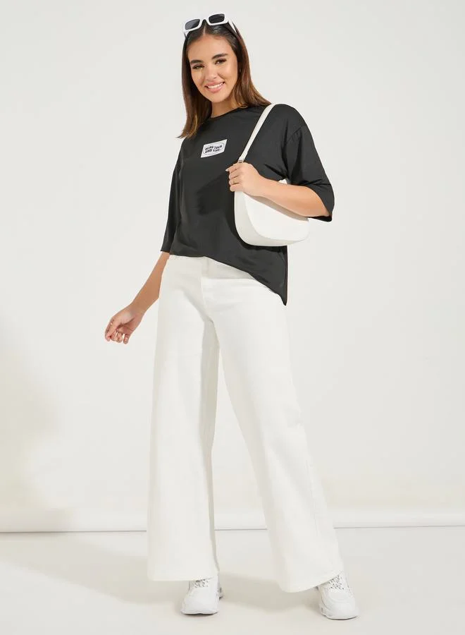 Styli Oversized Patch Label T-Shirt with Dropped Shoulder