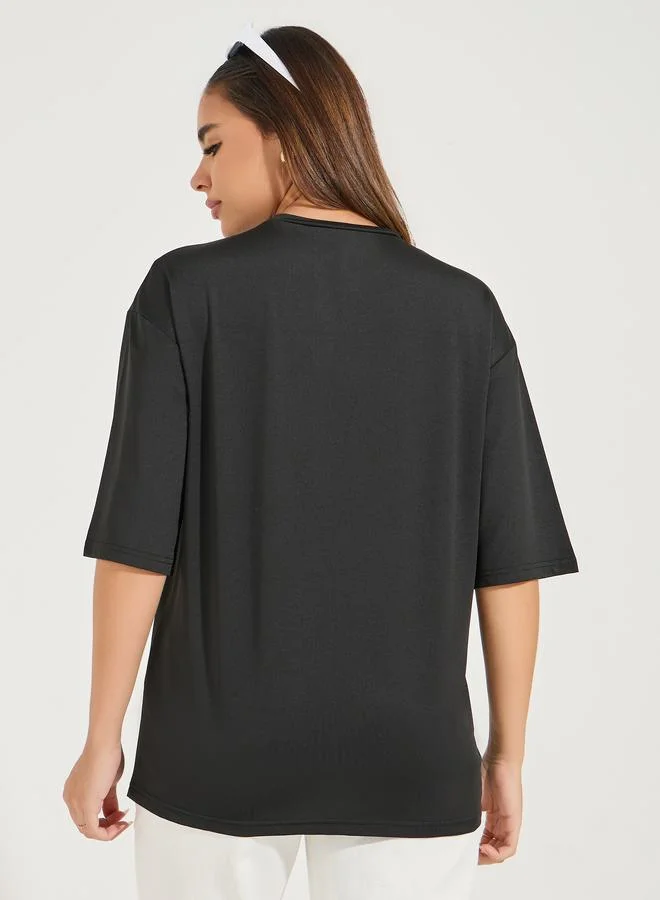 Styli Oversized Patch Label T-Shirt with Dropped Shoulder