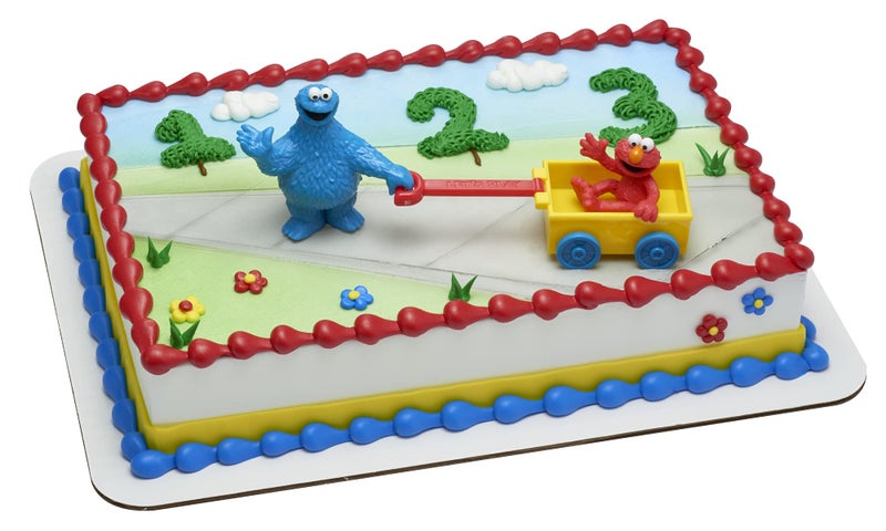 DecoPac DecoSetÂ® Sesame StreetÂ® Let's Play Cake Topper, 2-Piece Birthday Cake Decoration with Cookie Monster and Elmo in a Free-Wheeling Wagon, Ready to Use, Food Safe - Image 1