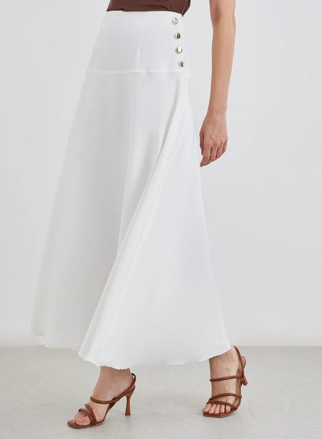 ستايلي Styli Solid A-Line Maxi Skirt with Button Detail