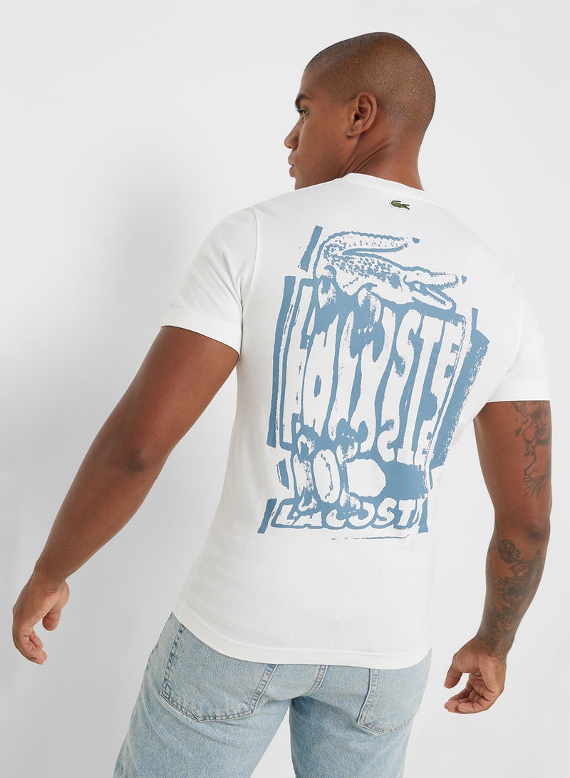 لاكوست تيشيرت بياقة دائرية وأكمام قصيرة بطبعة شعار - Image 1