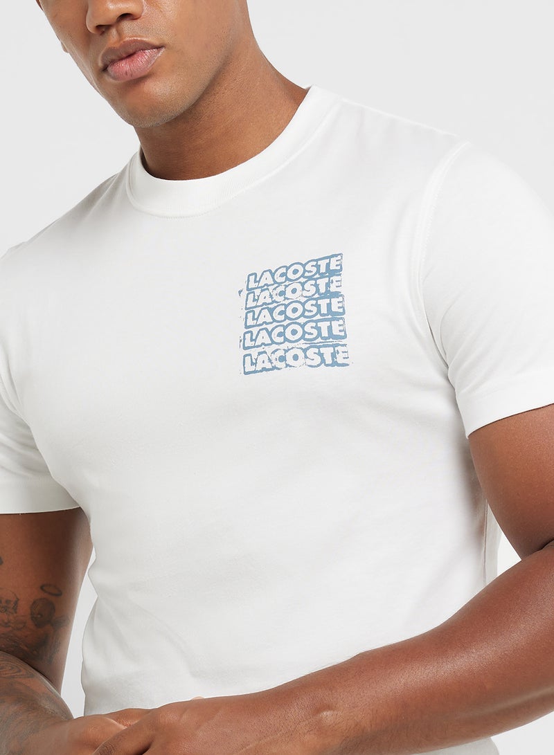 لاكوست تيشيرت بياقة دائرية وأكمام قصيرة بطبعة شعار - Image 3