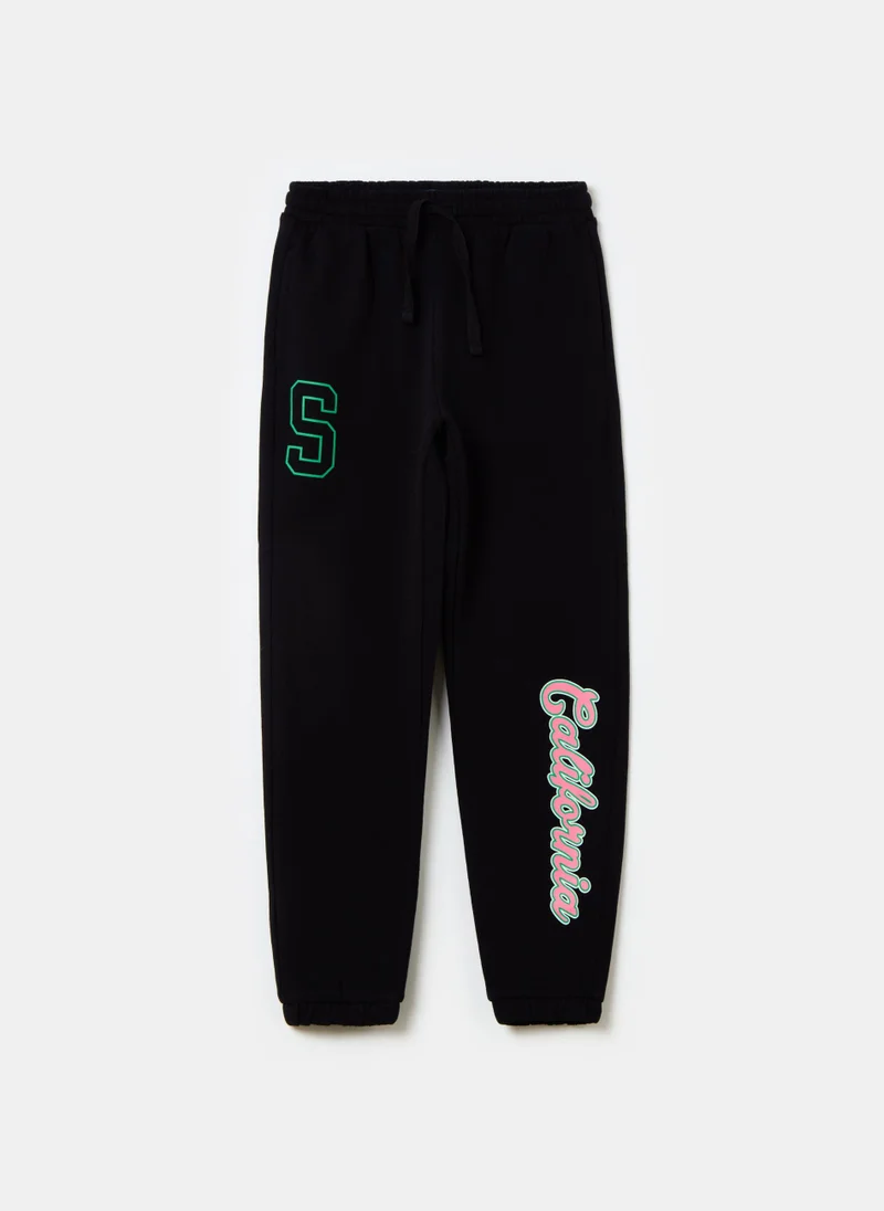 او في اس Fleece joggers with drawstring and print