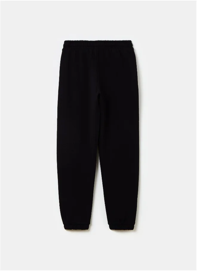 او في اس Fleece joggers with drawstring and print