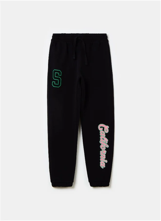 او في اس Fleece joggers with drawstring and print