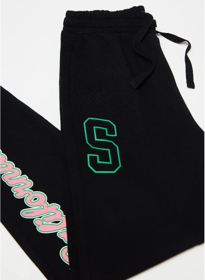 Ovs Fleece joggers with drawstring and print