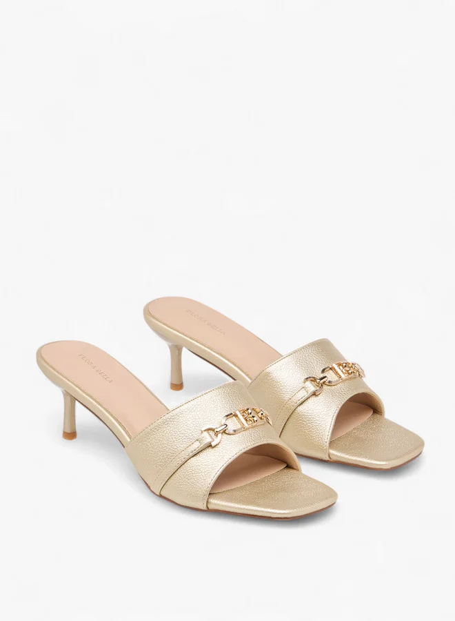 فلورا بيلا من شو إكسبرس Women Metal Accent Slip-On Sandals with Stiletto Heels