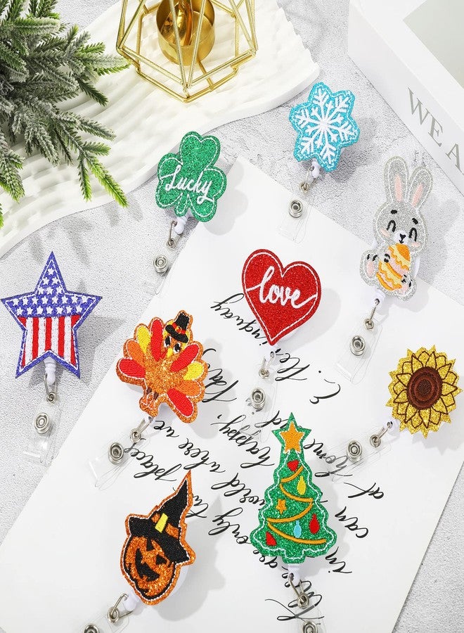 وولاين مجموعة Whaline المكونة من 9 قطع من بكرات شارات لامعة موسمية من اللباد، تتضمن أشكال قلب الحب، والبرسيم المحظوظ، والأرنب، والنجمة المخططة، وعباد الشمس، واليقطين، والديك الرومي، وشجرة عيد الميلاد، وندفة الثلج، وحاملات شارات تعريفية تحمل أسماء العطلات، مناسبة للمكاتب والمدارس والممرضات. - Image 5