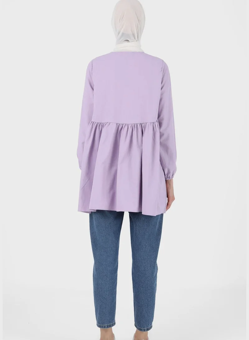 رفقة من مودانيسا تونيك بأكمام بالون