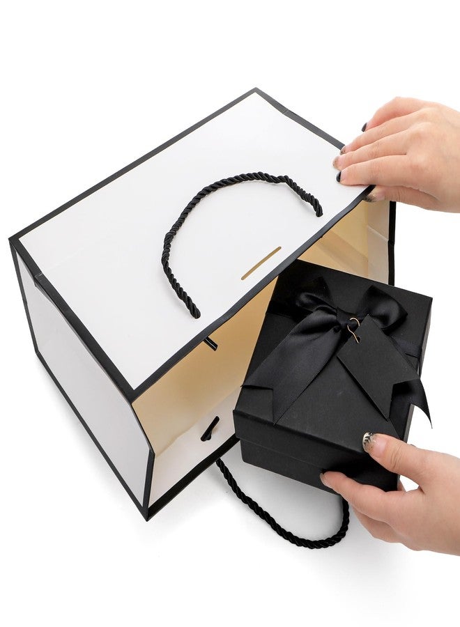 تيبري أكياس هدايا تيبيري، عبوة من 30 كيسًا بمقبض، أكياس ورقية متوسطة الحجم مزينة بشريط، أكياس تغليف بيضاء وسوداء لحفلات عيد الحب، وحفلات الزفاف، وحفلات وصيفات العروس، وأعياد الميلاد، وحفلات التخرج، وحفلات الانتقال إلى منزل جديد، مقاس 11 × 3.9 × 7.8 بوصة - Image 3