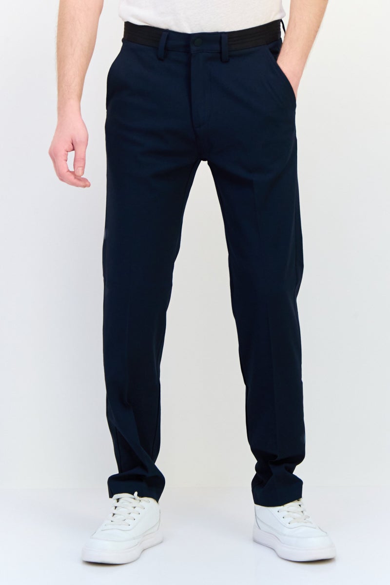 Celio سروال رجالي بقصة عادية، سادة، قابل للتمدد، ساق مستقيم، لون كحلي - Image 1